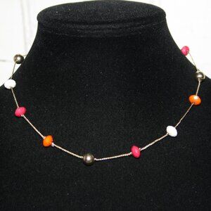 Beautiful gold, orange, white and pink necklace by Charming Charlie
